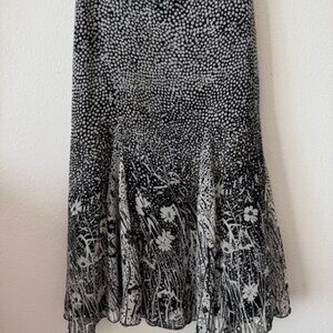 Women's lined black skirt with flounced hem